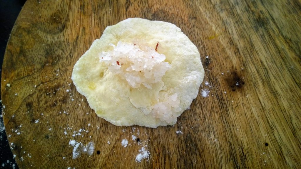 Dough filled with sweetened coconut