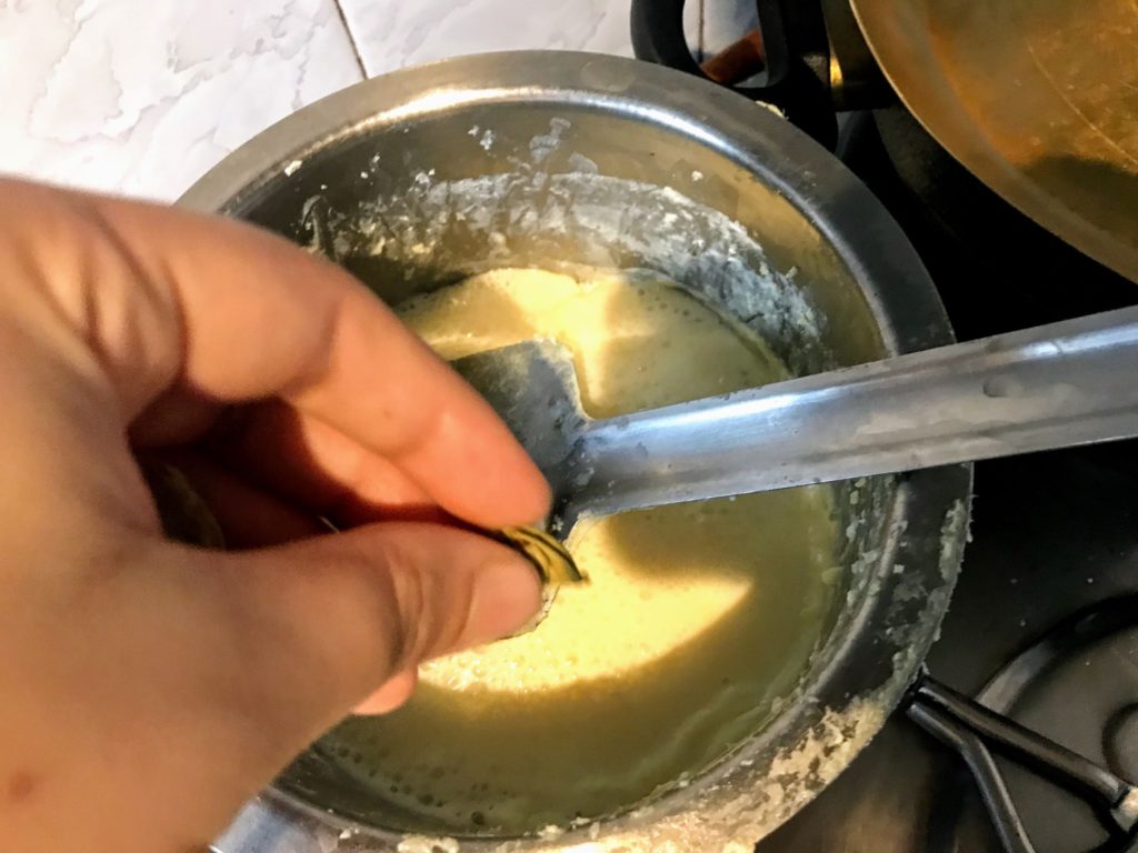 Green cardamom in thickened milk